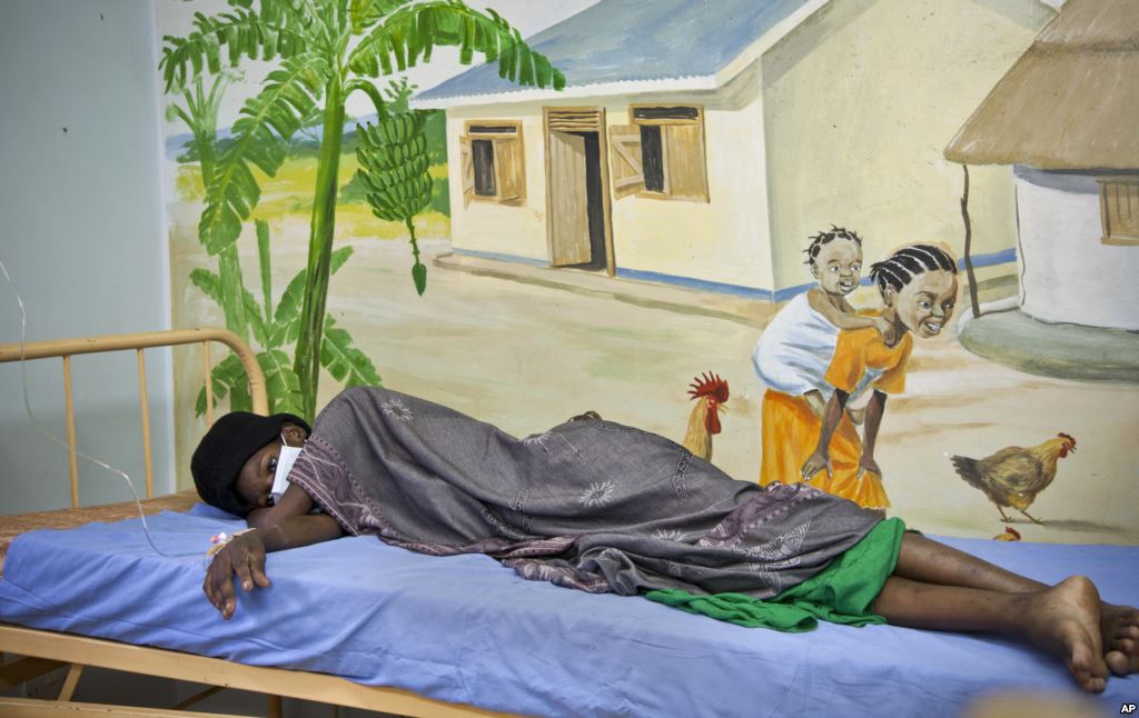 A newly-diagnosed HIV positive woman in the treatment ward of the Mildmay, Uganda clinic, Feb. 27, 2014. 